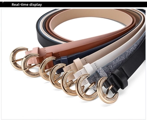 Close-up of elegant women's skinny belts with rhinestone buckles in seven vibrant colors