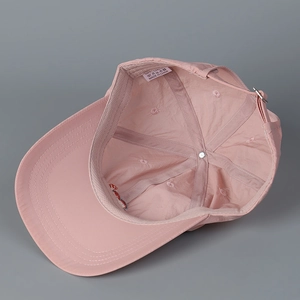 Pink breathable quick-dry baseball cap with heart detail and internal structural view