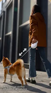 Retractable pet leash detail showing durable nylon rope with 200lbs high tensile strength