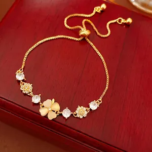 Adjustable Gold Plated Alloy Bracelet With Cat Eye Stone Flower Clover Pendant Sparkling Zircon High End Jewelry For Women