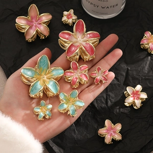 Romantic bohemian frangipani hair claw clips with gradient colors and gold plating