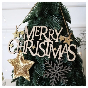 Detailed wooden Merry Christmas letter pendant with golden glitter star on green tree