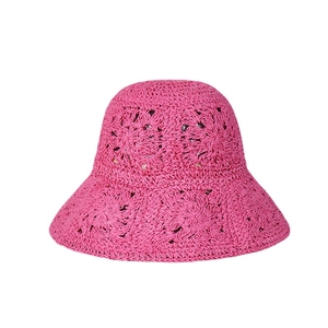 Foldable hot pink bohemian straw sun hat with wide brim and hollow crochet flower patterns