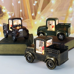 Retro Christmas truck lantern set with Santa Claus inside and sparkling holiday light effects