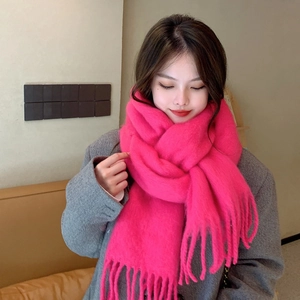 Stylish rose pink mohair scarf with fringe tassels for winter warmth and soft texture