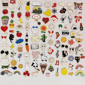 Variety collection of colorful cartoon enamel pins featuring animals and coffee designs