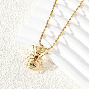 Gold ant pendant necklace with red teardrop stone and zircon stones for women