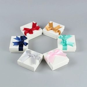 Square jewelry gift boxes with ribbon bows in multiple colors for rings and necklaces