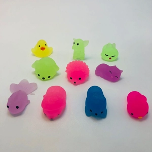 Macro shot of colorful animal mochi squishies including duck and cat made of soft TPR