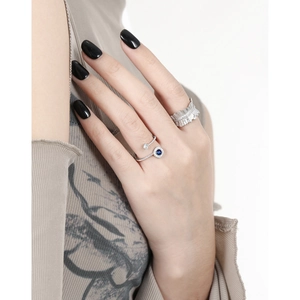 Luxurious S925 sterling silver crossover ring with blue zircon and pavé crystals