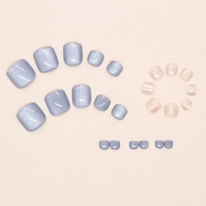 Détails de faux ongles de pieds oeil de chat bleu et paillettes champagne en tailles