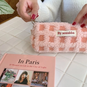 Close-up of pink waffle fleece pencil case with soft texture and metal zipper pull
