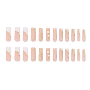 Nude pink press-on nails with 3D white daisy flowers and gold beads decoration