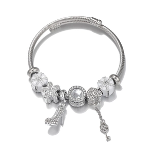 Silver stainless steel charm bracelet featuring high heels, heart lock and crystal pendants