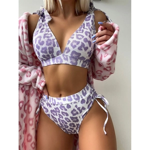Women's two-piece purple leopard bikini set with high-waisted bottoms and ribbed texture