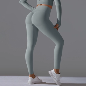 Close-up of seamless high-waisted yoga leggings showing peach butt lift and fabric texture