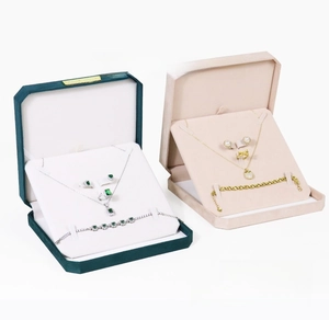 Macro view of octagonal velvet jewelry box interior for necklaces and rings