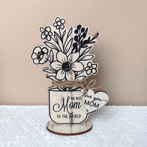 Close-up of wooden flower ornament with The Best Mom in the World text for Mother's Day gift
