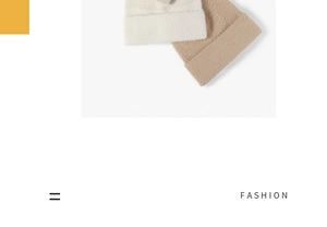 Flat lay of knit beanies in beige and camel colors showing soft feather yarn texture