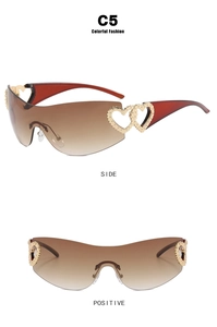Frameless Y2K sunglasses with brown gradient lenses and gold double heart accents