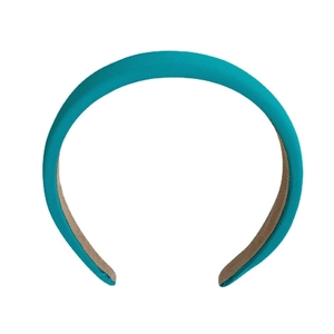 Padded wide candy color headband in vibrant teal fabric with a soft beige inner lining