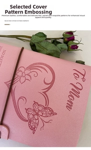Detail of pink faux leather notebook with To Mom embossing and butterfly patterns
