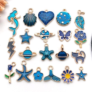 Detailed collection of 20 blue enamel alloy charms featuring mermaid, shells and star shapes