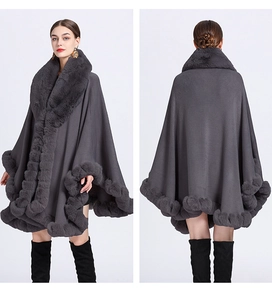 Front and back view of a grey knit shawl cape with elegant faux rabbit fur trim for women