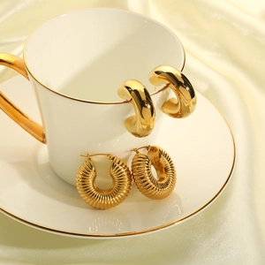 Polished 18k gold plated hollow hoop earrings and croissant texture twist design