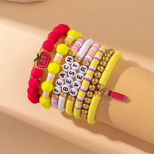 Detail of colorful beaded bracelets with apple charms and 'TEACH BEST EVER' letter beads