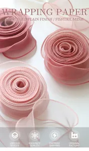 Top view of layered pink gradient organza ribbons with wavy fishtail edges for gift wrapping