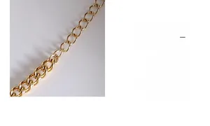 Detailed view of 18k gold plated titanium chain links with polished oval buckle structure