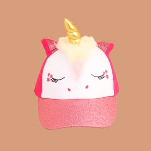 Close-up of a pink unicorn kids baseball cap with gold horn and sequin ears detail