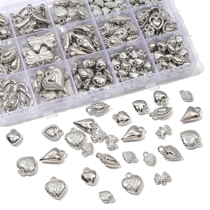 Silver CCB heart and bow pendant kit for DIY jewelry making displayed in a clear box