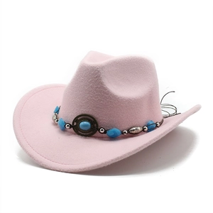 Pink wool felt western cowboy hat with bohemian beaded band on a white background