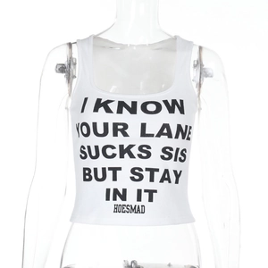 Close-up of a white cropped tank top featuring black bold slogan letter printing