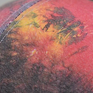 Detailed macro view of the breathable mesh texture on this washed ponytail baseball cap