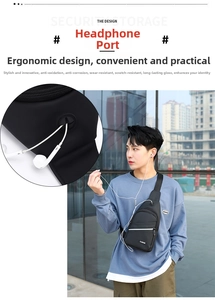 Detailed close-up of a black minimalist chest bag showing the dedicated silicone earphone port