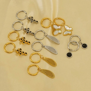 Minimalist stainless steel hoop earrings with butterfly, cross and hollow wing charms