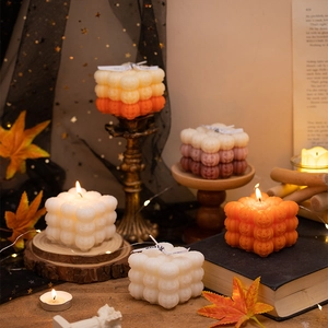 Bubble pumpkin scented candles in 3x3 matrix design with autumn maple leaf decoration