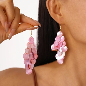 Elegant pink shell-textured circular layered tassel drop earrings with golden hooks