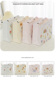 Exquisite cartoon bear and floral paper gift bags in pastel colors showing four unique designs