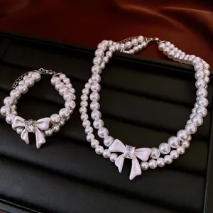 Double-layer pearl jewelry set with bow pendant and crystal zircon for women