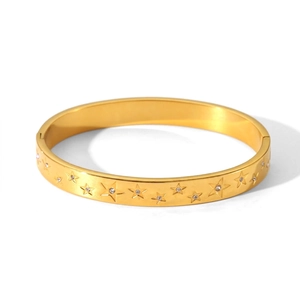 Detail view of gold stainless steel star bracelet with inlaid crystals and 0.8cm width