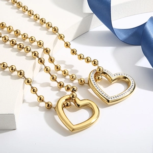 Fashionable gold stainless steel beaded necklaces with heart pendants and crystal accents