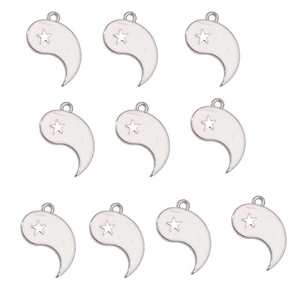 Macro view of 10 white Yin Yang Tai Chi pendants with hollow star design for DIY jewelry