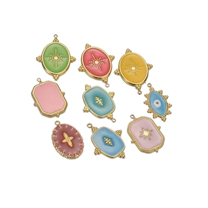 Colorful 14k gold plated stainless steel enamel pendant charms on white background
