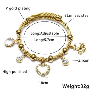 Bracelet en maille d'acier doré réglable avec breloques cœur en zircon et ancre
