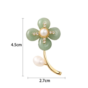 Baroque pearl and green gemstone flower brooch in gold finish with crystal accents