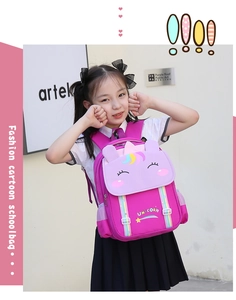 Girl wearing a pink and purple unicorn backpack with rainbow straps in a bright setting